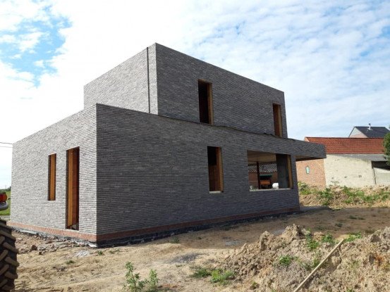 Bouwen van appartementsblok Steenhuize, Oost-Vlaanderen